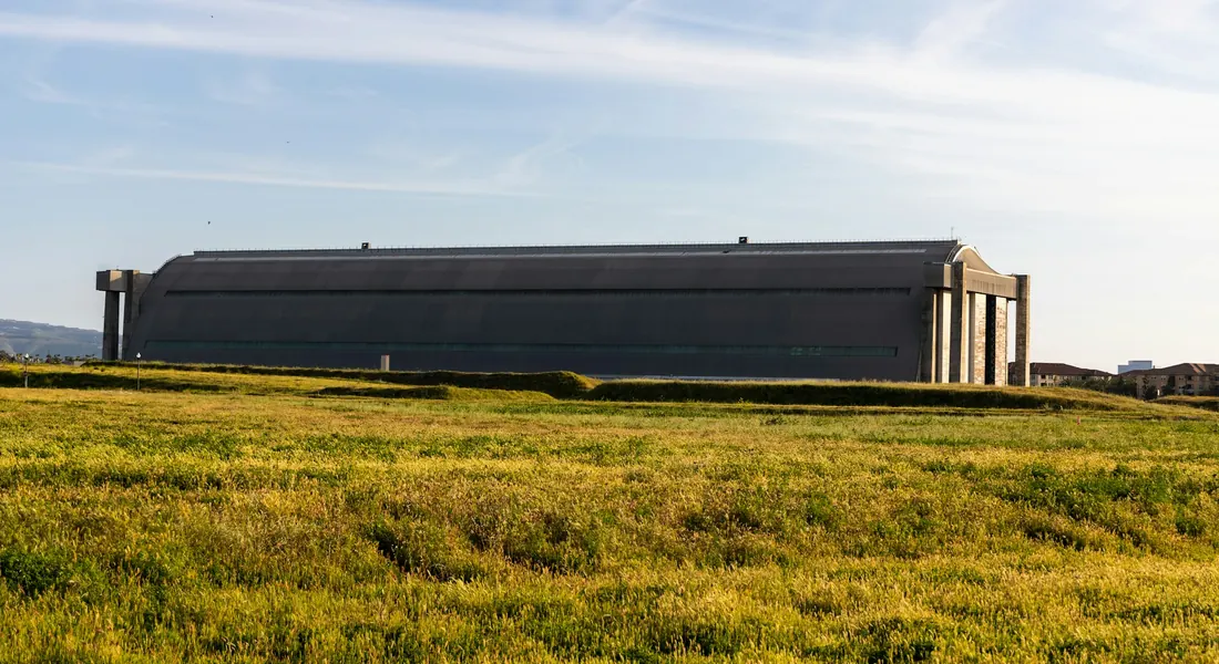 The historic Tustin blimp hangar on a grassy field